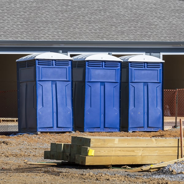 what is the cost difference between standard and deluxe portable toilet rentals in Spring Grove Indiana
